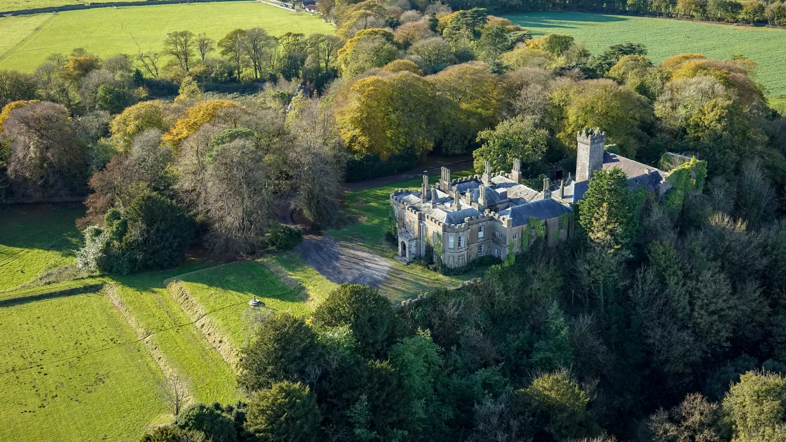 Aerial drone photograph of Penllyn Castle and its surrounding woodland