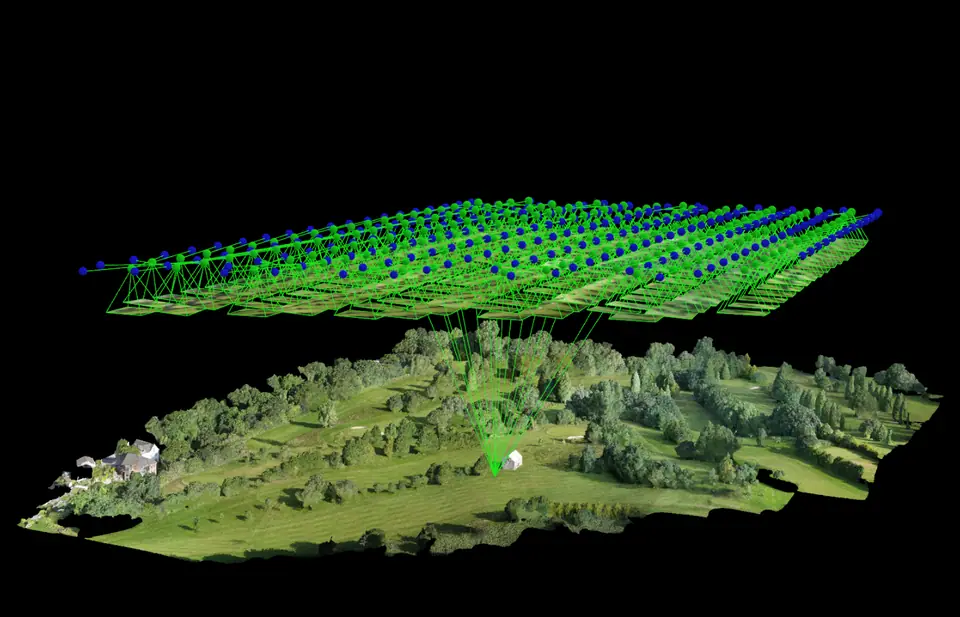 Photogrammetric processing view showing drone camera positions above a 3D terrain model